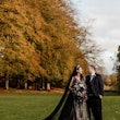 Bride In Art Deco Black Elaine By Maggie Sottero With Groom