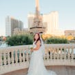 Bride at a Las Vegas Wedding Wearing Lace Ballgown Called Ellen by Rebecca Ingram