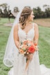 Bride Wearing Boho-Chic A-line Wedding Dress Courtney By Rebecca Ingram