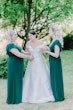 Bride Wearing Off-The-Shoulder A-Line Wedding Dress Called Coral By Rebecca Ingram With Her Bridesmaids