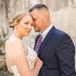 Bride Wearing Glamorous Lace And Sequin Wedding Dress Called Tuscany By Maggie Sottero In Close With Groom Holding Jacket