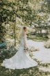 Bride wearing Marguerite wedding dress by Maggie Sottero