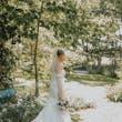 Bride wearing Marguerite wedding dress by Maggie Sottero