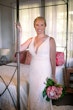 Real Bride in Boho Oversized Floral Lace Wedding Dress with Deep V-Neckline and Pearl Buttons Called Burke by Maggie Sottero