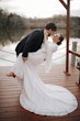 Groom with Bride in Geometric Allover Lace Wedding Dress with Sweetheart Neckline Called Dover by Maggie Sottero