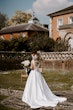 Groom With Bride Wearing Mikado A-Line Wedding Dress Raven By Maggie Sottero