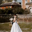 Groom With Bride Wearing Mikado A-Line Wedding Dress Raven By Maggie Sottero
