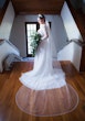 Bride wearing Lorraine Dawn wedding dress by Rebecca Ingram