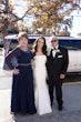 Bride wearing Mitchell Marie by Maggie Sottero with her parents