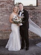 Bride Wearing Classic Elegant Wedding Dress Called Sebastiane By Maggie Sottero Posing With Groom Long Veil