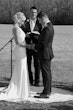 Real Bride in Bead Embroidery Deep Keyhole Back Wedding Dress Named Bellarose By Rebecca Ingram at the Alter