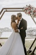 Bride Wearing Sparkly Ballgown Wedding Dress Called Shasta By Sottero And Midgley Kissing Groom At The Altar