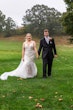 Bride wearing Wendi wedding dress by Rebecca Ingram with her husband
