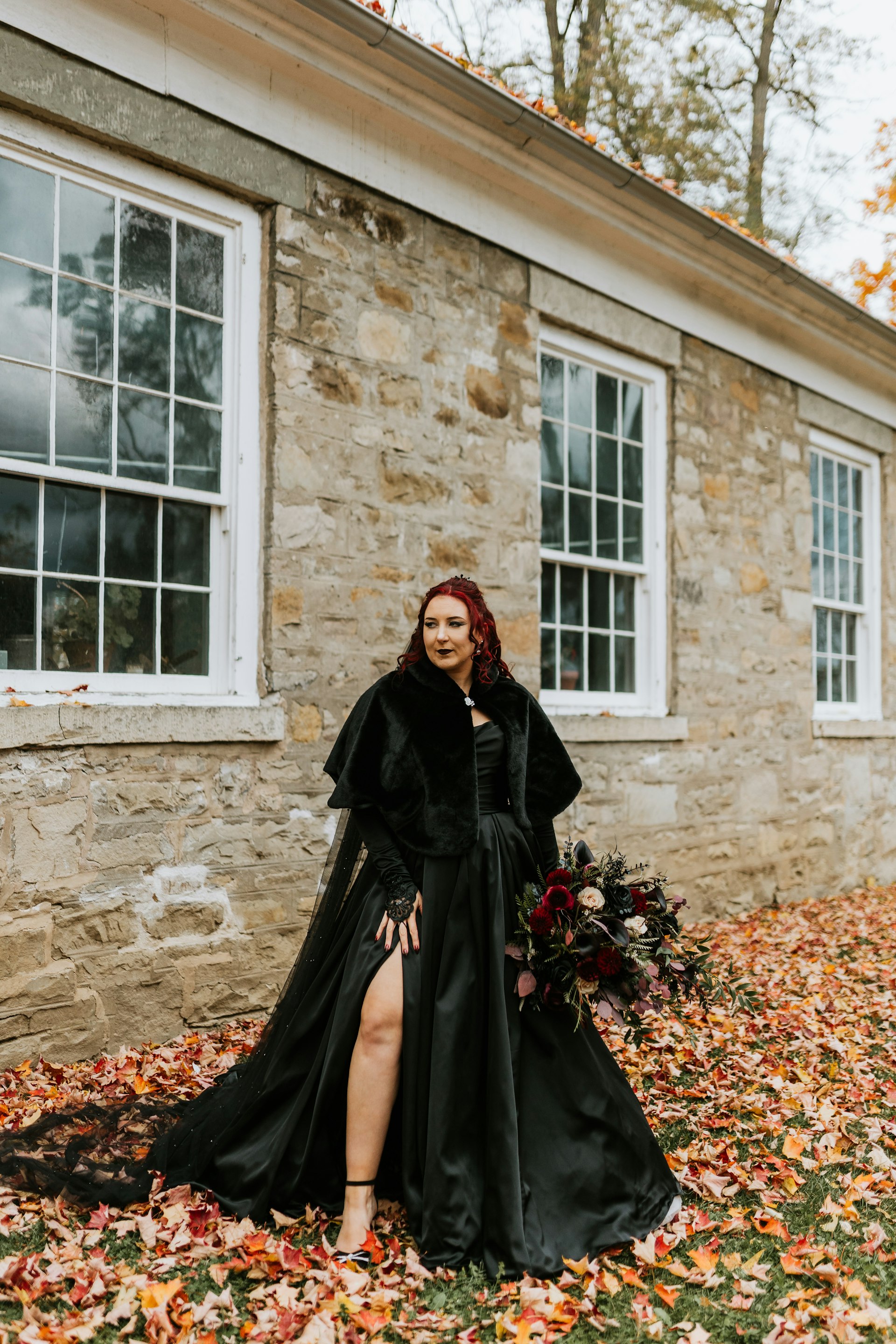 Bride Wearing Black Aline Wedding Dress Called Scarlet By Maggie Sottero In Fall Leaves