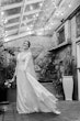 Bride Wearing Boho Sleeved Wedding Dress Called Drita By Maggie Sottero