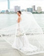 Bride wearing Marvine wedding gown by Sottero and Midgley 