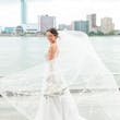Bride wearing Marvine wedding gown by Sottero and Midgley