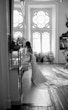 Bride wearing Cecilia by Rebecca Ingram looking in the mirror