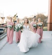 Bride wearing Hattie Lane Marie wedding dress by Rebecca Ingram with bridesmaids