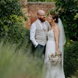 Bride wearing Lorraine by Rebecca Ingram with her husband