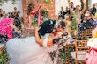 Bride wearing Anniston Marie by Maggie Sottero being kissed by her husband after their ceremony