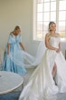 Bride wearing Selena by Maggie Sottero having her veil fluffed by her mother