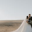 Bride And Groom Together. Bride Wearing Simple Ball Gown Wedding Dress With An Elegant Overskirt Called Kyrie By Maggie Sottero