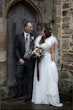 Bride Wearing Chiffon Lace Wedding Dress Called June By Maggie Sottero Looking At Groom