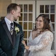 Bride wearing Seneca wedding dress by Sottero and Midgley smiling at her husband