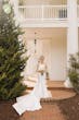 Bride Wearing Simple Mermaid Wedding Dress Called Mitchell By Maggie Sottero Next To A Pine Tree