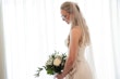 Bride wearing Davis Leigh wedding dress by Sottero and Midgley