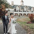 Groom with Bride in Sweetheart Neckline Wedding Dress with Floral Lace Motifs Called Hattie Lane Lynette Marie by Rebecca Ingram