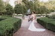 Bride Wearing Sparkly Fit And Flare Wedding Dress Called Anniston Lane By Maggie Sottero In A Garden