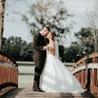 Groom With Bride Wearing White Lace A-line