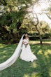 Bride wearing Lettie by Rebecca Ingram