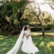 Bride wearing Lettie by Rebecca Ingram
