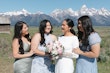 Bride wearing Aston by Sottero and Midgley with her bridesmaids