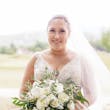 Curvy real bride wearing lace mermaid wedding dress called Judson by Maggie Sottero.