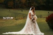 Bride wearing Kingsley wedding gown by Sottero and Midgley