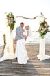 Bride wearing Saratoga by Maggie Sottero being dipped by her husband