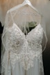 Pia wedding dress by Maggie Sottero hung up