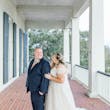 Groom with Bride Wearing A-Line Wedding Dress Called Wallis by Maggie Sottero