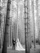 Bride Wearing Simple Fit And Flare Wedding Dress Called Mitchell Marie By Maggie Sottero Reading Vows To Groom In The Forest