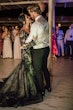 Bride Wearing Black Fit And Flare Wedding Dress Called Zander Lane By Sottero And Midgley With Sleeves Dancing With Groom