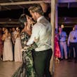 Bride Wearing Black Fit And Flare Wedding Dress Called Zander Lane By Sottero And Midgley With Sleeves Dancing With Groom