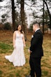 Bride In Lace Beaded Mermaid Wedding Dress Called January By Maggie Sottero With Groom