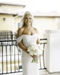 Bride Wearing Pearl Sparkly Bridal Gown Called Drew By Maggie Sottero Smiling Widely