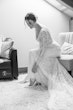 Bride Wearing Boho Sleeved Wedding Dress Called Drita By Maggie Sottero Getting Ready