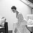 Bride Wearing Boho Sleeved Wedding Dress Called Drita By Maggie Sottero Getting Ready