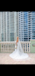 Bride Wearing Lace Mermaid Wedding Dress Called Bronson By Sottero And Midgley On A City Balcony